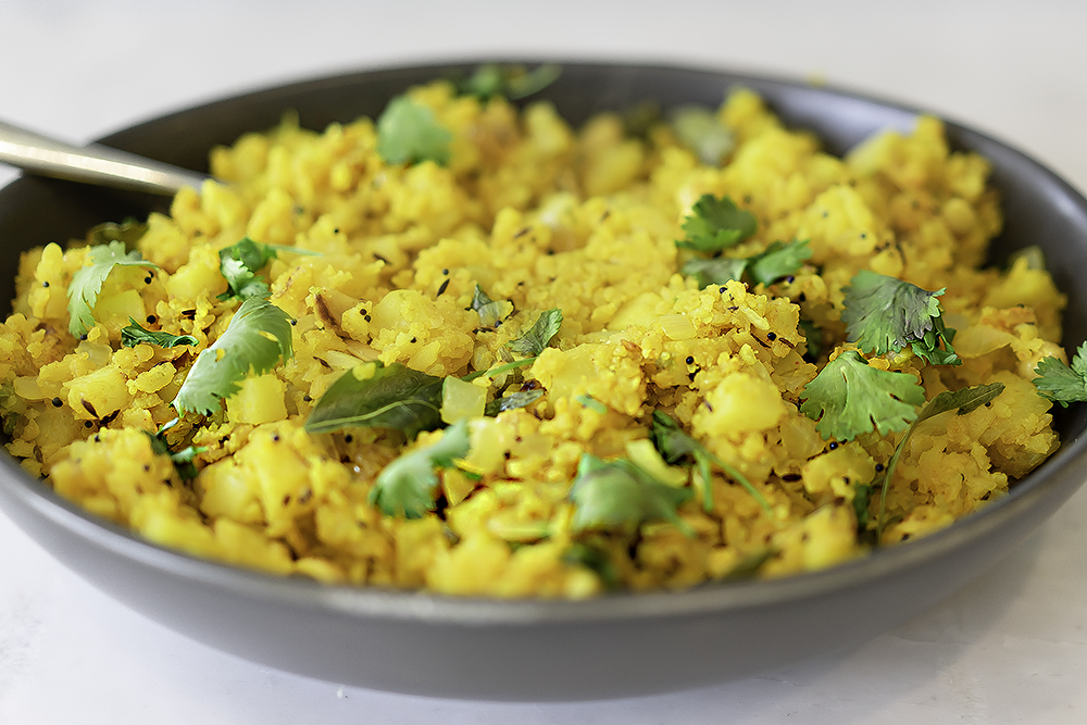 Easy Batata Poha or Indian Bataka Poha made with flattened rice flakes, potatoes, onions, and Indian spices #myvegetarianfamily #incrediblyindian #glutenfreeindianfood