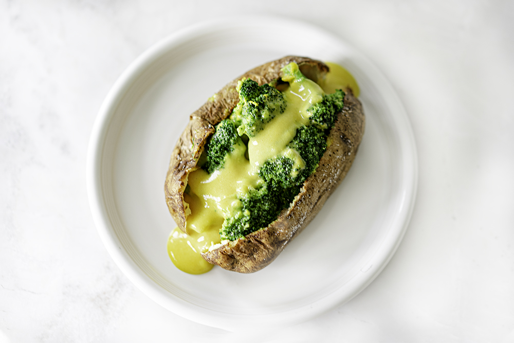 Air Fryer Baked Potato Recipe | ACMy Vegetarian Family #easybakedpotatoes #crispybakedpotatorecipe #airfryerlove #airfryerloadedbakedpotato #vegancheesesauce
